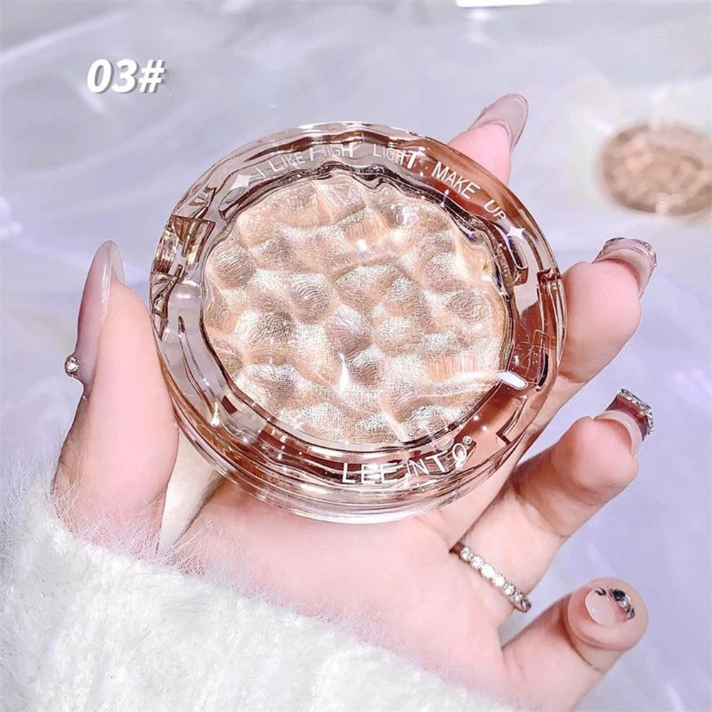 Tidesmit LEE INTO face highlighter powder with silky mashed potato texture and pearlescent shimmer detail view