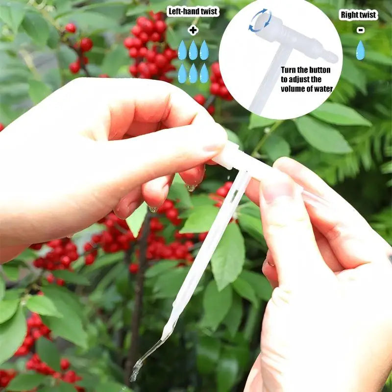Hands adjusting a white drip nozzle on an automatic watering tube for plant flow