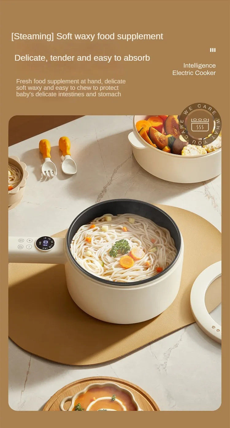White electric hot pot cooker with clear lid, filled with noodles.