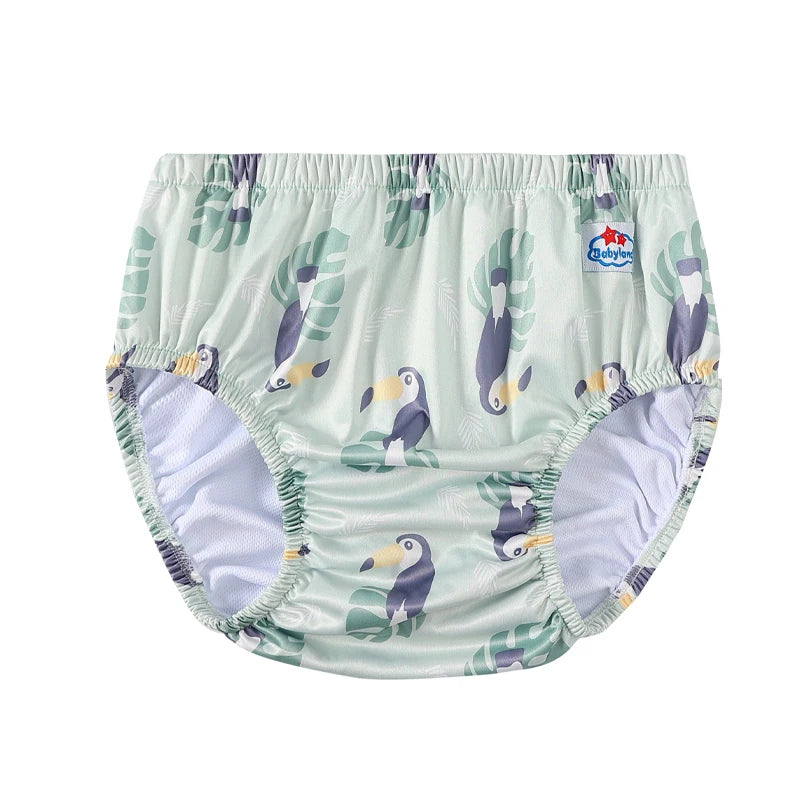 Babyland baby training diaper featuring a green toucan and tropical leaf print pattern.