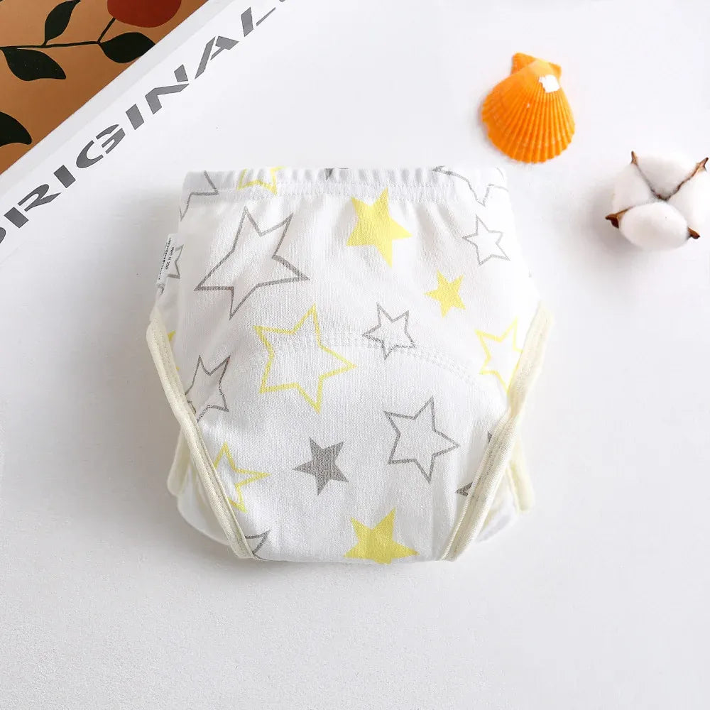 Baby care training diaper with yellow and grey star print, soft cotton fabric for toddlers.