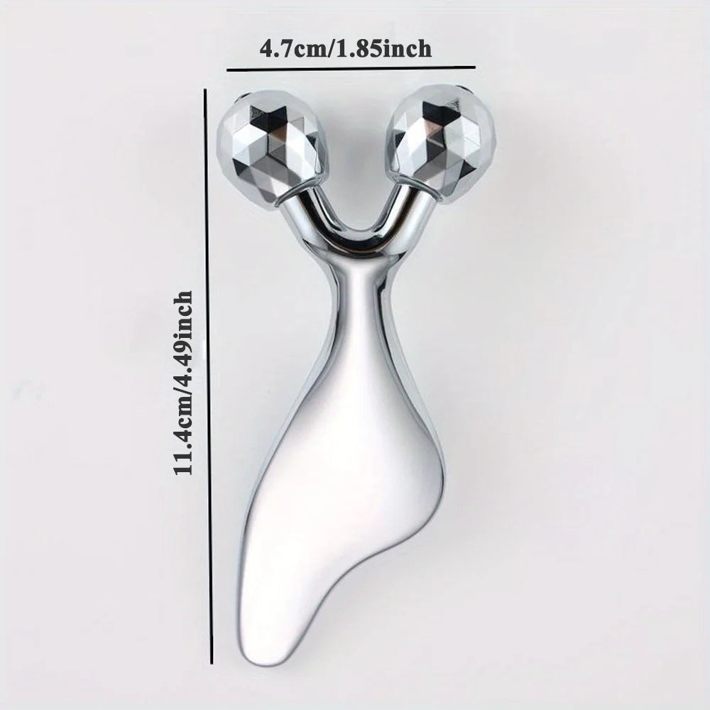Silver 2-in-1 facial roller and gua sha tool with faceted rollers and measurement labels on a white background.