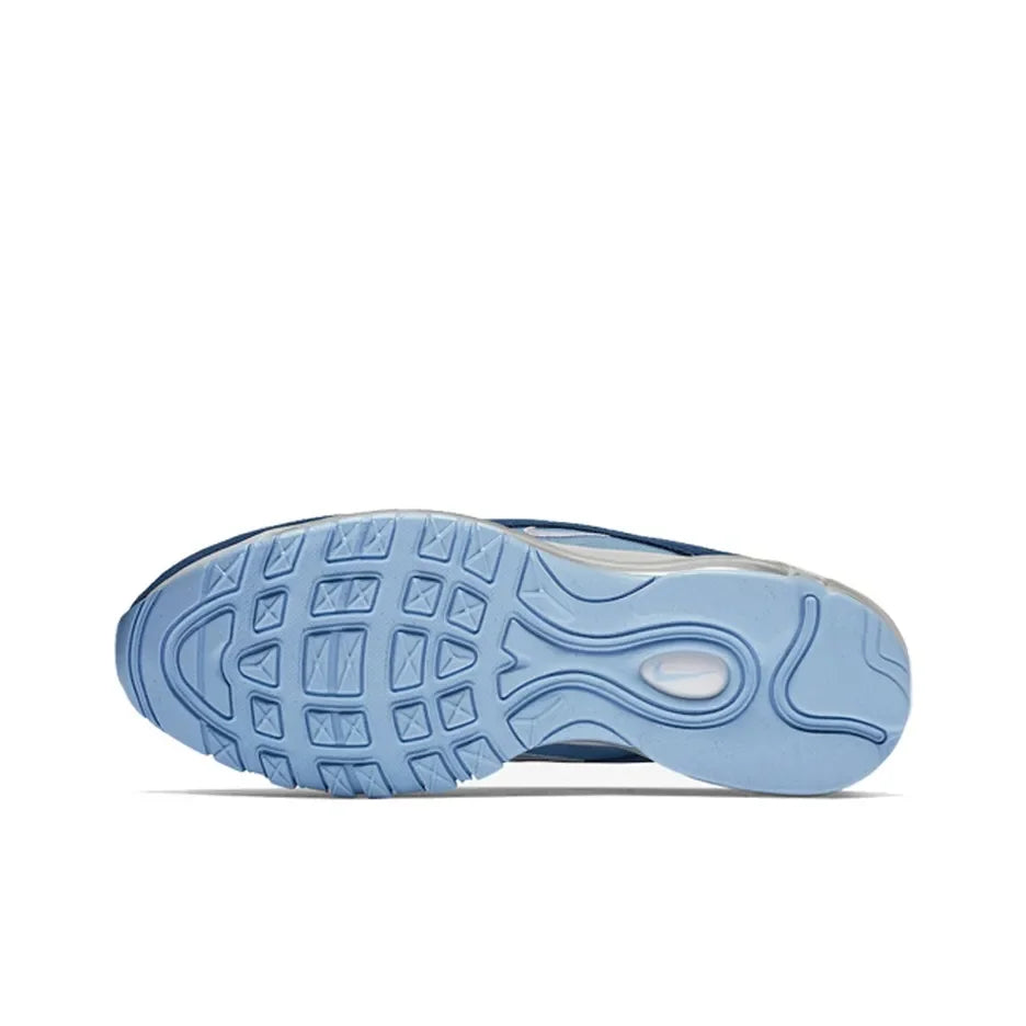 Light blue rubber outsole of Nike Air Max 97 sneakers with lugged traction pattern and cushioned heel.