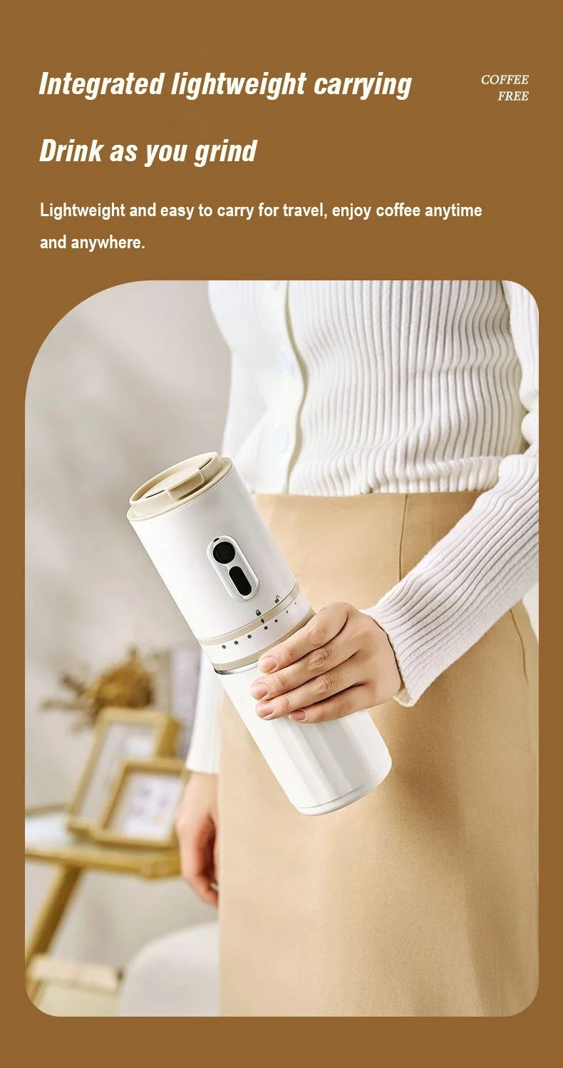 Portable white electric coffee grinder and travel mug with beige lid held in hand for on-the-go brewing.