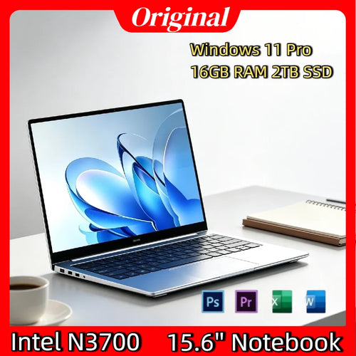 Ultra-slim silver laptop with thin bezels, black keyboard, trackpad, and multiple side ports on a white desk.