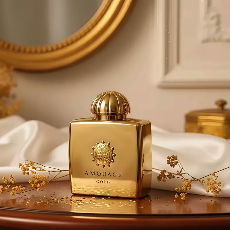 Amouage Gold EDP: Luxury unisex oriental fragrance in a sleek, metallic gold square bottle with a domed cap.
