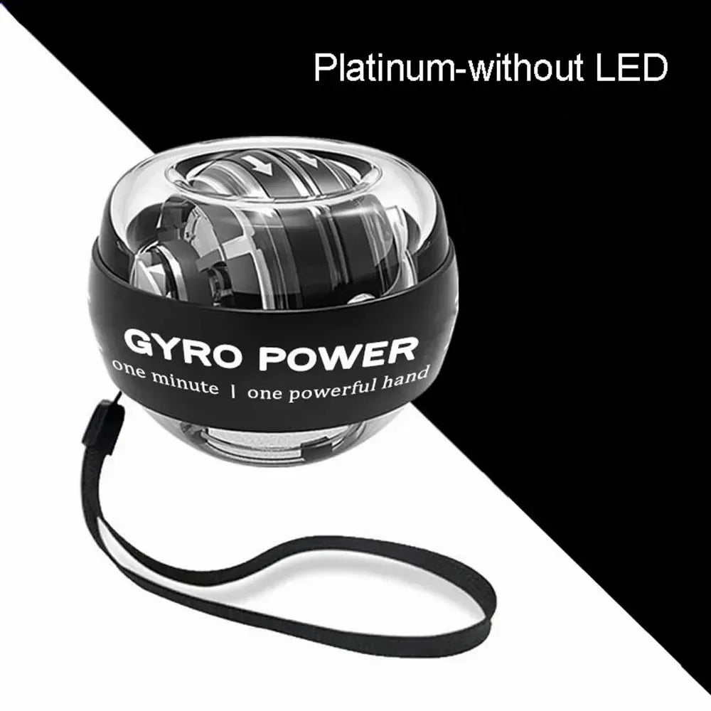 Platinum wrist exerciser ball with a clear plastic shell, internal metal rotor, and black safety wrist strap.