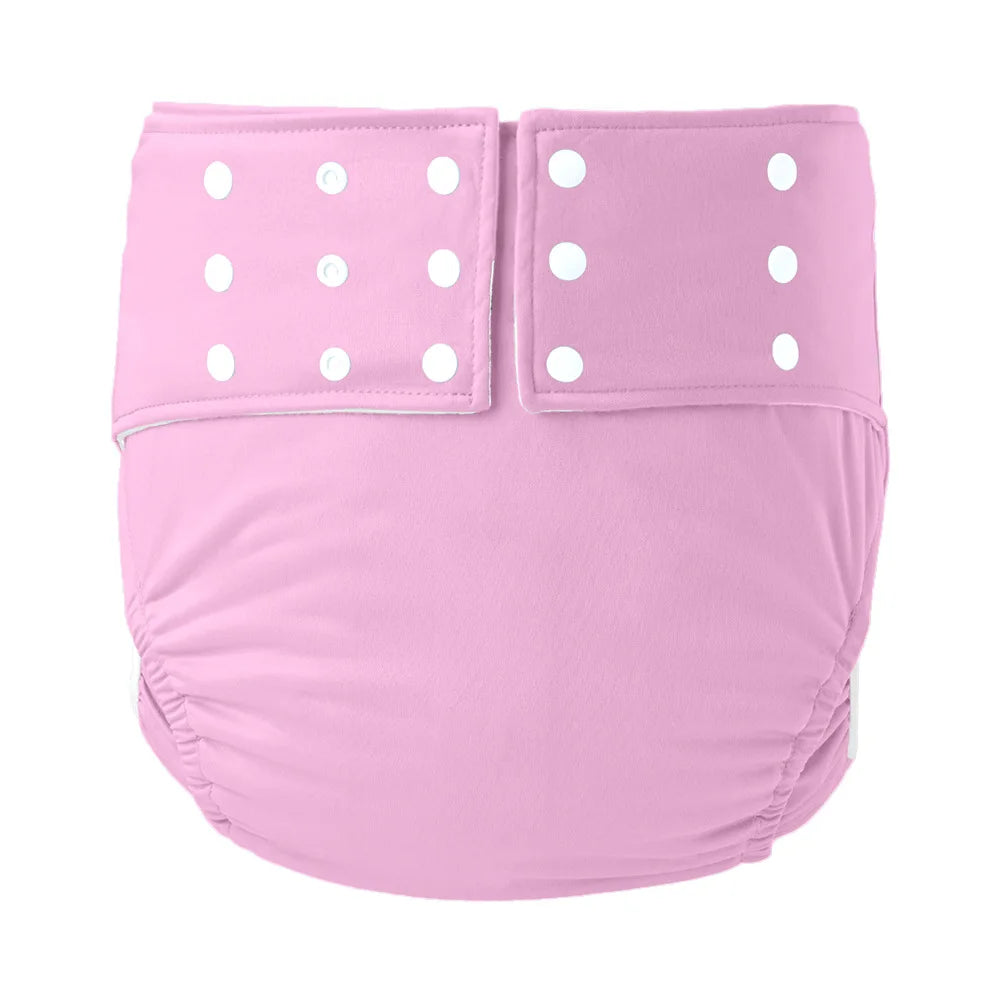 Reusable pink baby cloth diaper with adjustable white snap buttons for a customizable fit.