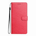 Red faux leather wallet phone case with a magnetic strap closure and a black wrist lanyard.