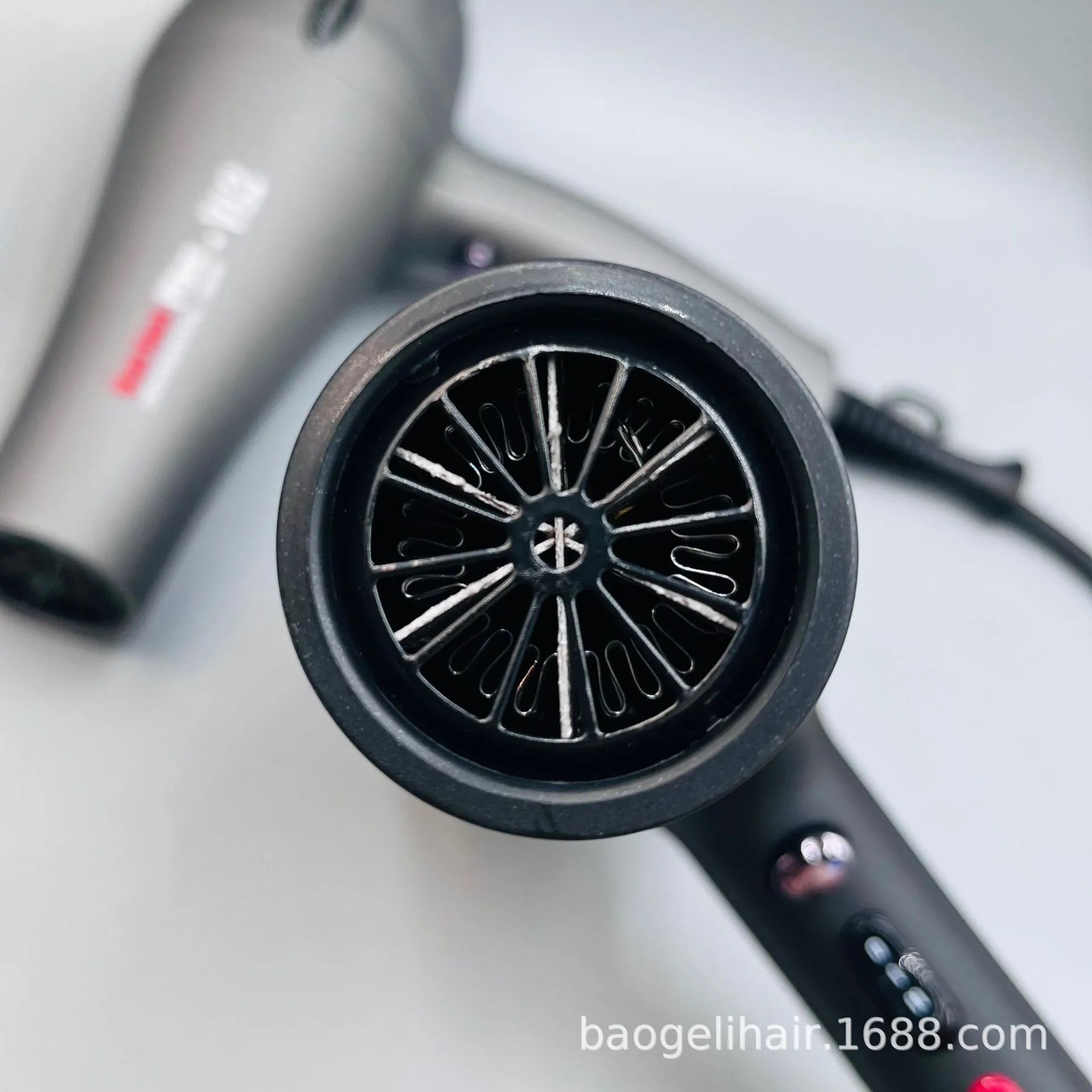 2600W professional negative ion hair dryer, gray matte finish with heat settings and powerful salon drying technology.
