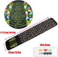 Black acupressure foot reflexology massage pad with colorful pressure stones and organ-labeled acupoint foot charts.