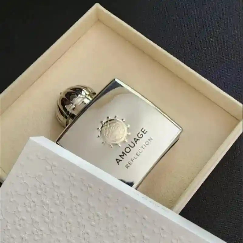 Amouage Reflection Women’s EDP 100ml. Silver square bottle, floral oriental scent. Sophisticated long-lasting perfume.