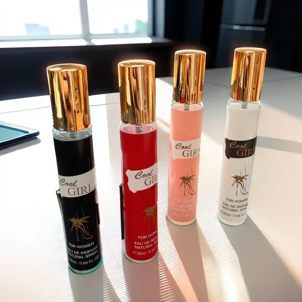 Cool Girl EDP perfume set for women. Slim cylindrical spray bottles with gold caps. Fresh, long-lasting gift box.