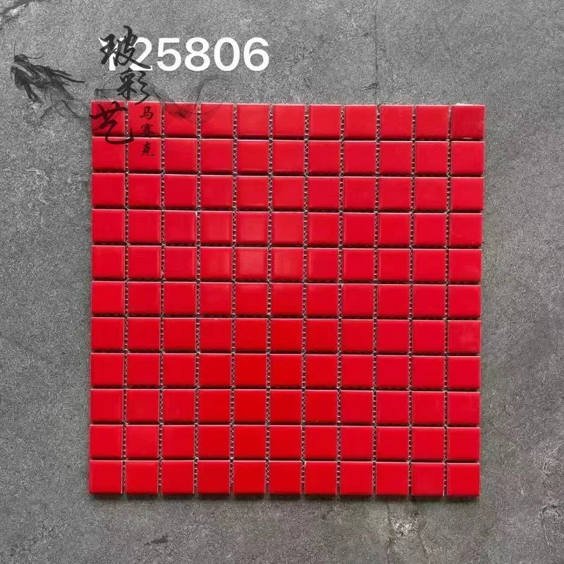 Ceramic mosaic tile sheet with red squares and dark grout lines