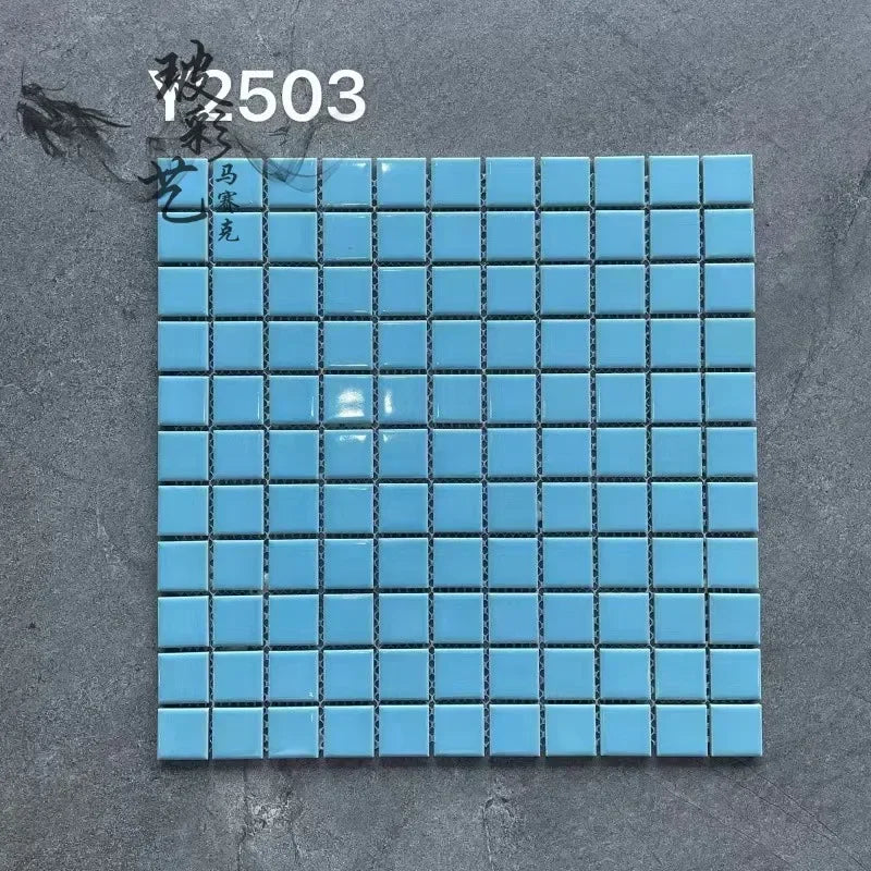 Ceramic mosaic wall tiles sheet with glossy light blue squares and dark grout lines