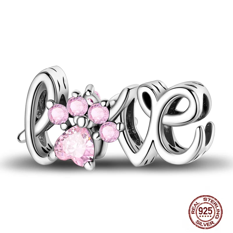 925 sterling silver 'LOVE' pet paw charm with pink crystals for DIY charm bracelets and pet lover jewelry.