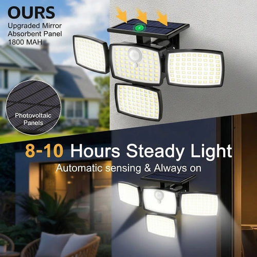 Black 4-head outdoor solar flood light mounted on a wall with top solar panel and bright LED panels.