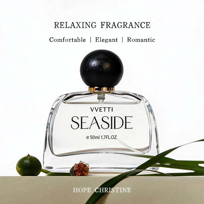 Vvetti Seaside luxury women's perfume, floral lavender, gardenia, camellia notes in a unique round-cap glass bottle.