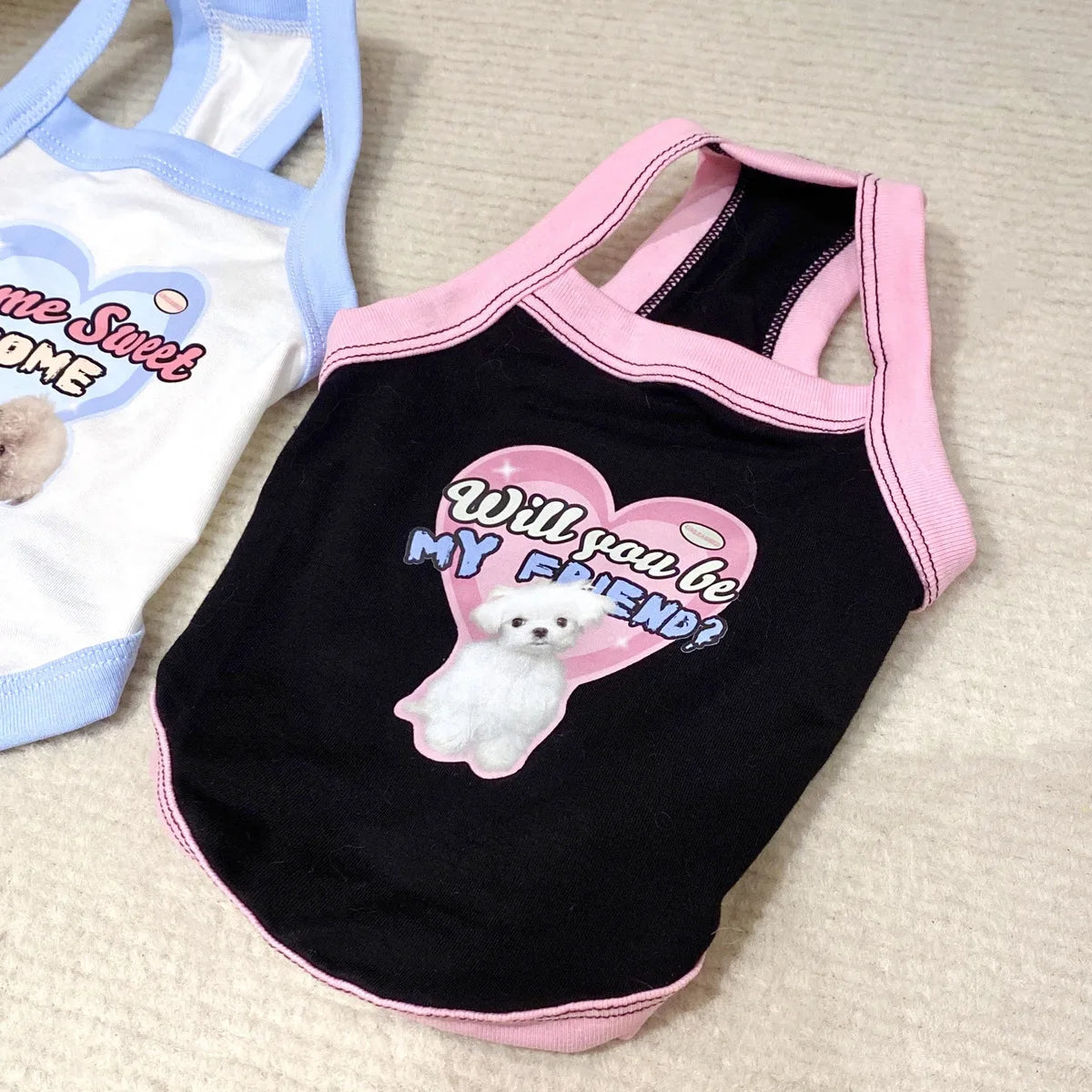 Cute black and pink puppy camisole vest for small dogs like Yorkies. Soft, stylish spring pet clothing with heart print.