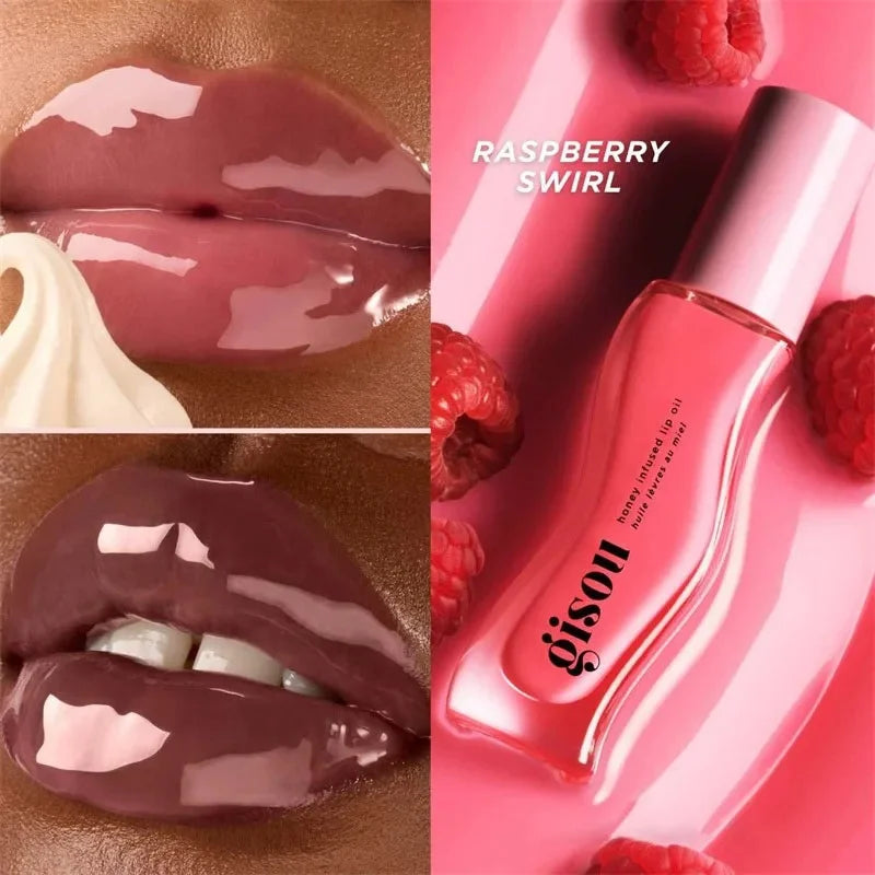 Gisou Honey Infused Lip Oil in Raspberry Swirl: a high-shine, glossy, plumping plum lip treatment with fresh berries.