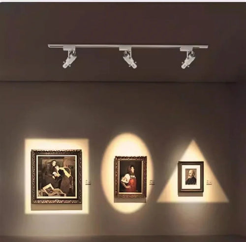 Track-mounted COB ceiling spotlight heads, three-way arrangement with adjustable angles