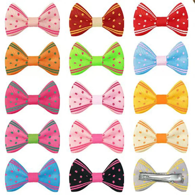 Colorful polka dot hair clips for dogs and cats. Cute grosgrain bow hairpins for small pet grooming accessories.