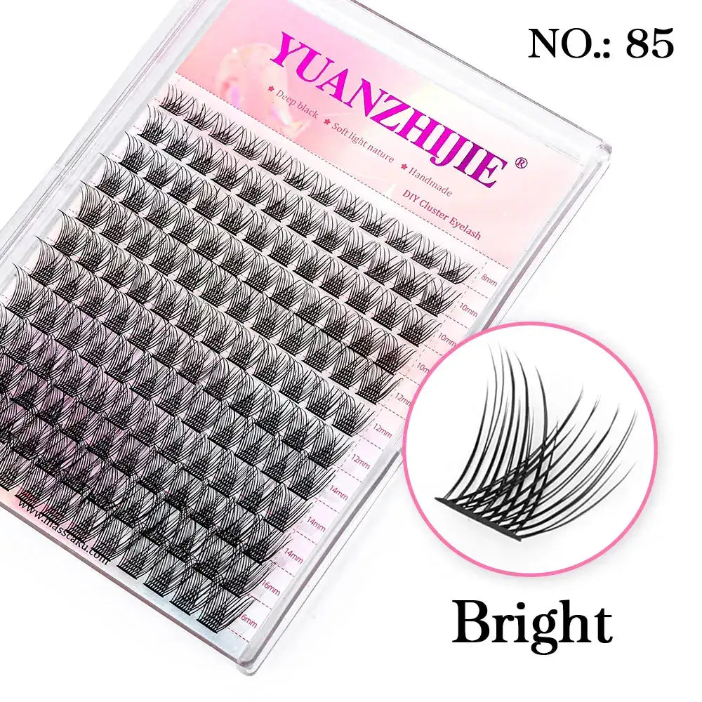 Clear tray of 144 black segmented DIY mink cluster lashes in various lengths, with a close-up circle view.