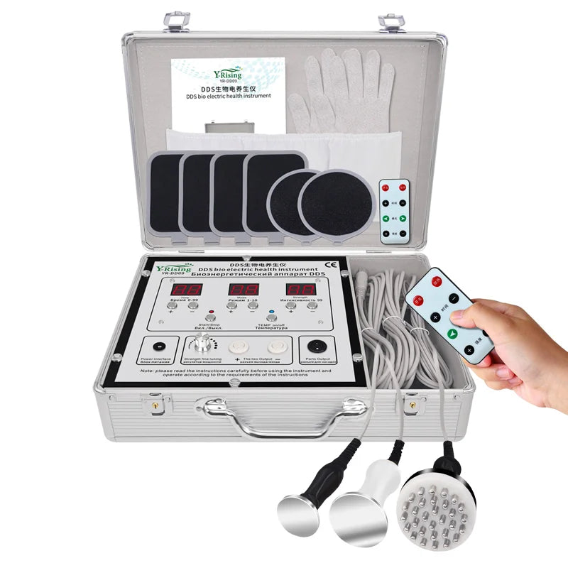 DDS bioelectrical therapy device in aluminum case with massager probes, remote, and pads for household health use.