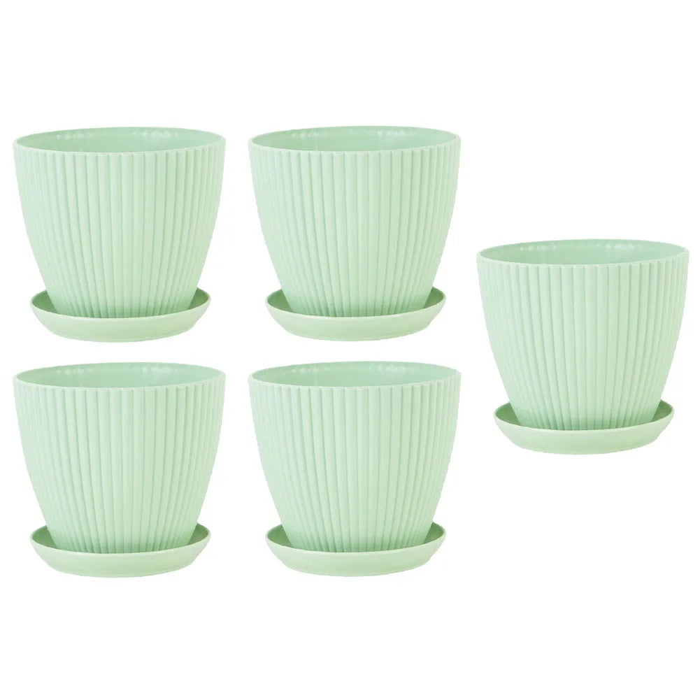 Light green ribbed resin planter set of five with saucers, vertical stripe design