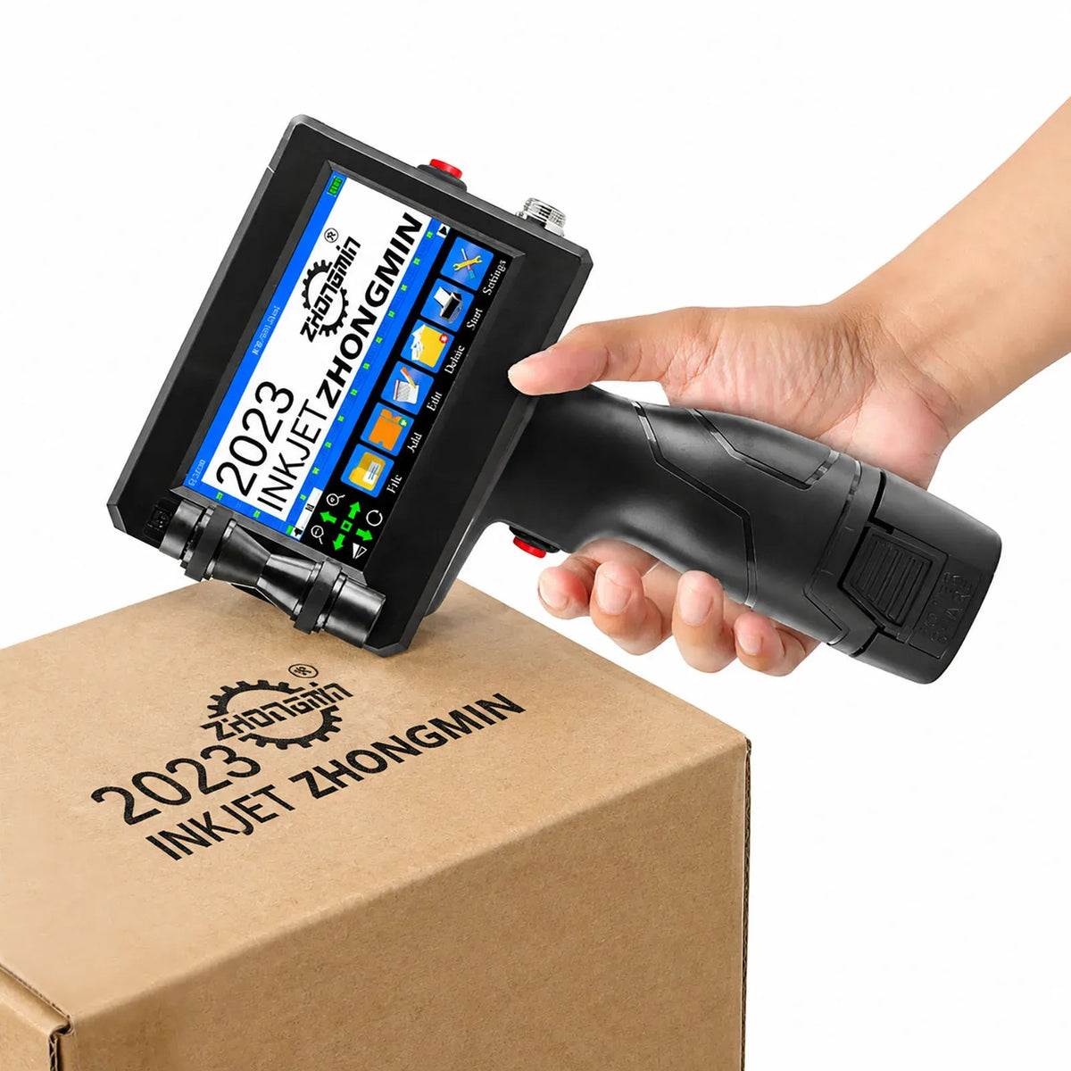 Handheld inkjet printer in black with touchscreen display, printing onto a cardboard box