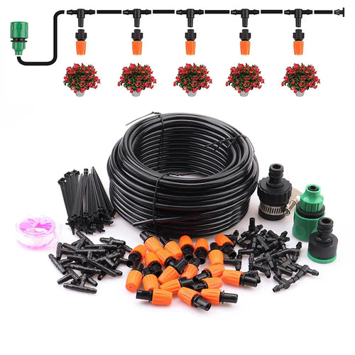 Black tubing coil kit with orange misting nozzles, green fittings, and cable ties