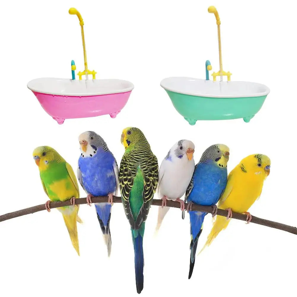 Automatic parrot bathtub shower bowls in pink and green plastic for fun bird cage grooming and bathing.