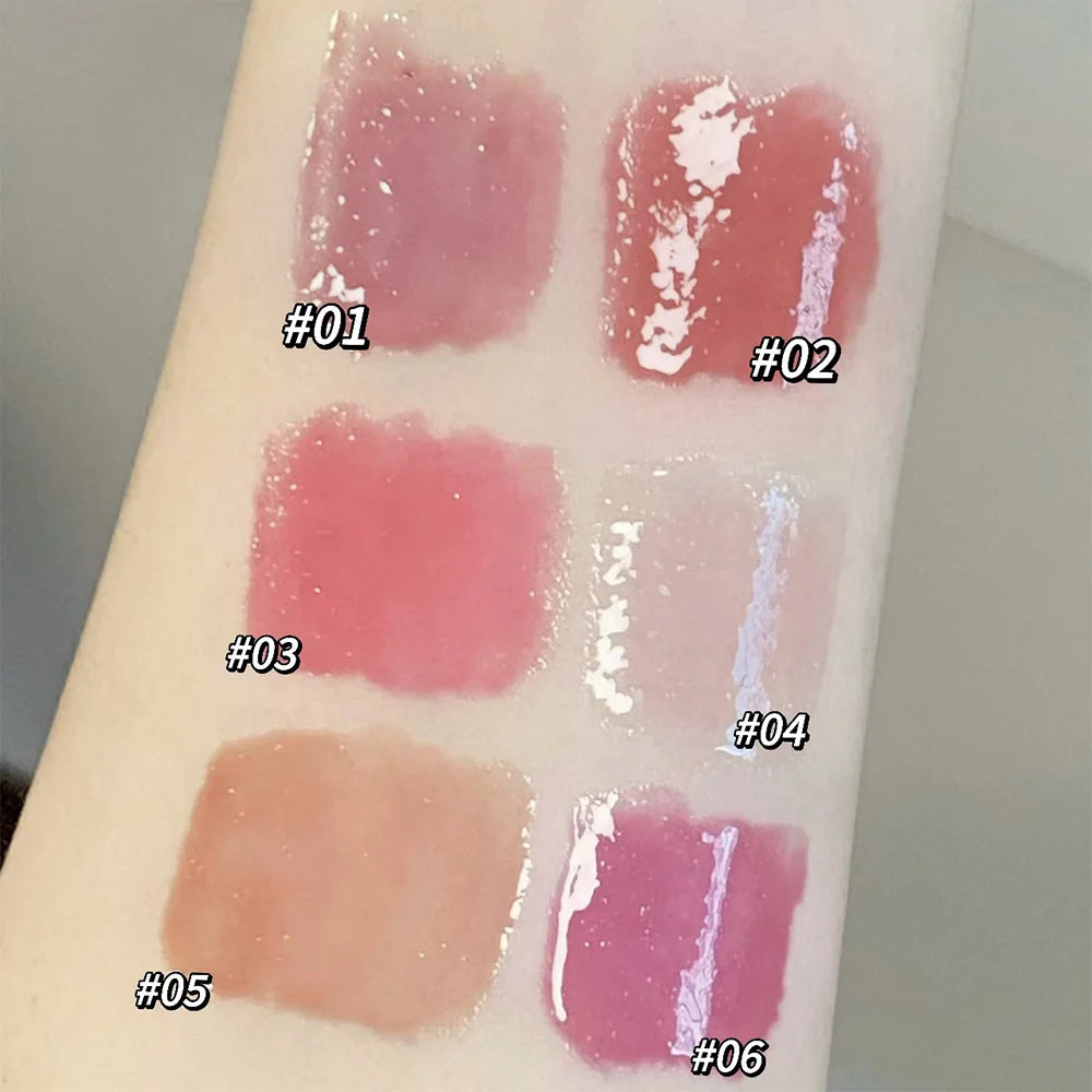Gege Bear moisturizing solid lip gloss swatches in six pink and nude watery, glossy shades on skin.