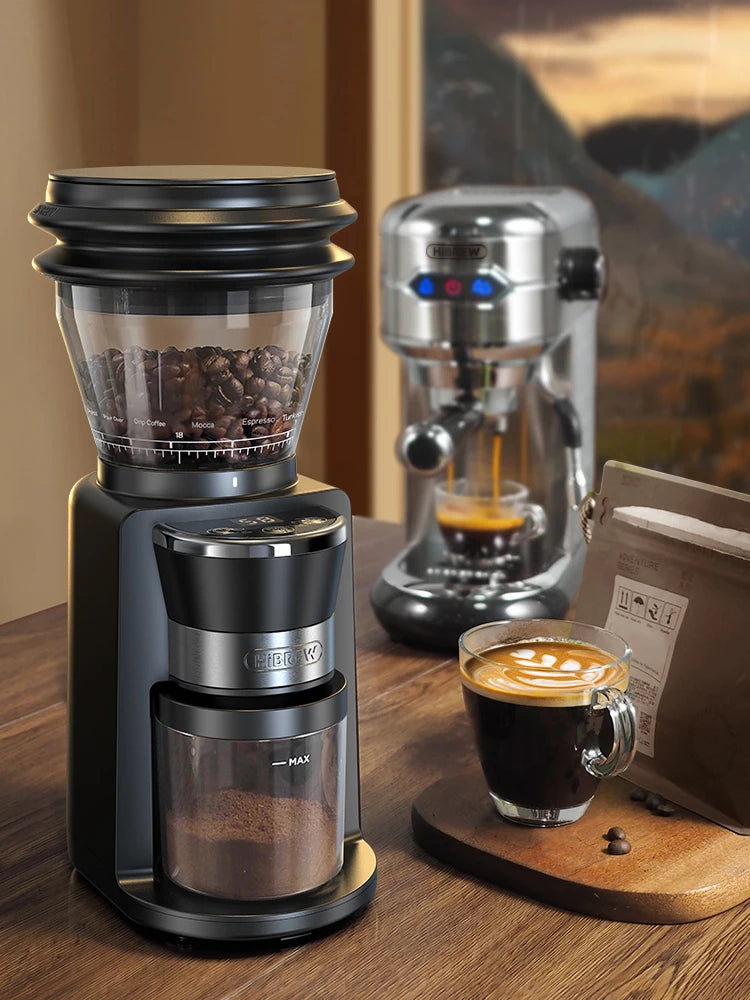 HiBREW black electric coffee grinder with clear bean hopper and grounds container next to espresso machine.