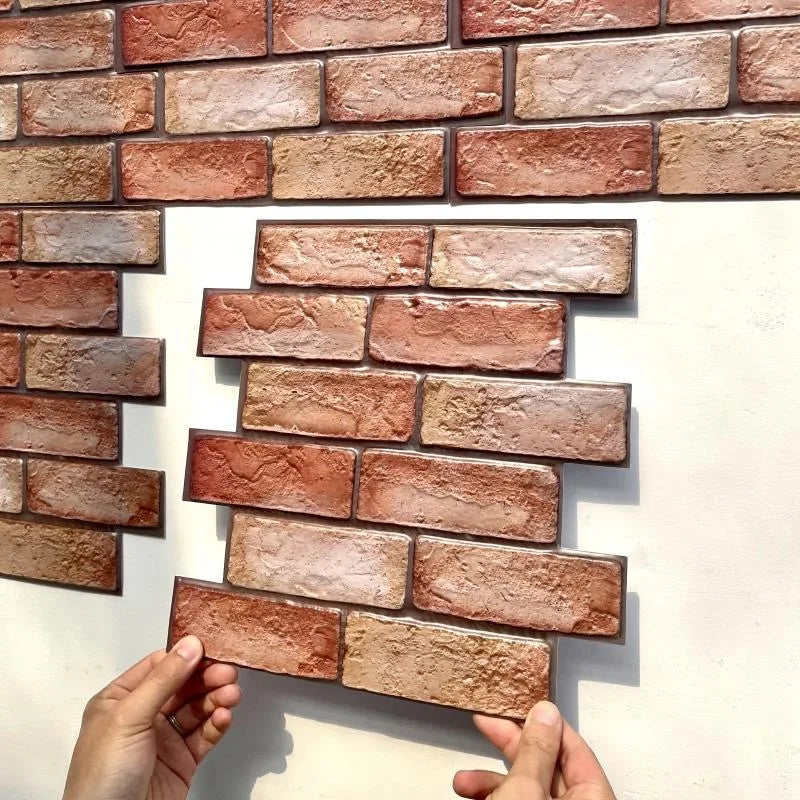 Brick-pattern peel-and-stick tile backsplash tiles in terracotta and tan, textured finish