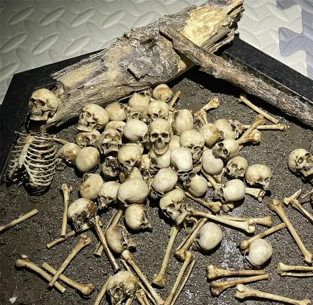 Mini 1:12 scale faux skeleton bone pile for reptile aquarium or spooky pet cabinet decor. Realistic beige resin prop.