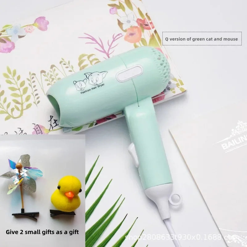 Mint green foldable mini travel hair dryer with cute cat print and 2 free gift accessories, 400w low power, compact.