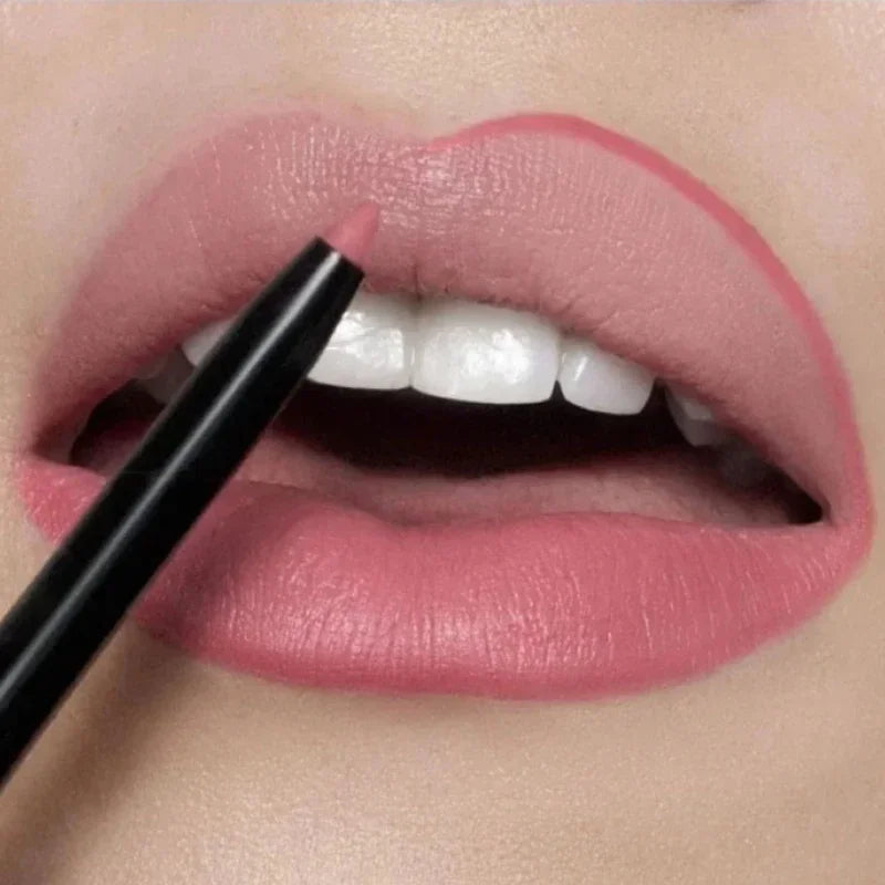 Waterproof nude brown lip liner pencil applying long-lasting, smooth matte lipstick to lips for a defined finish.