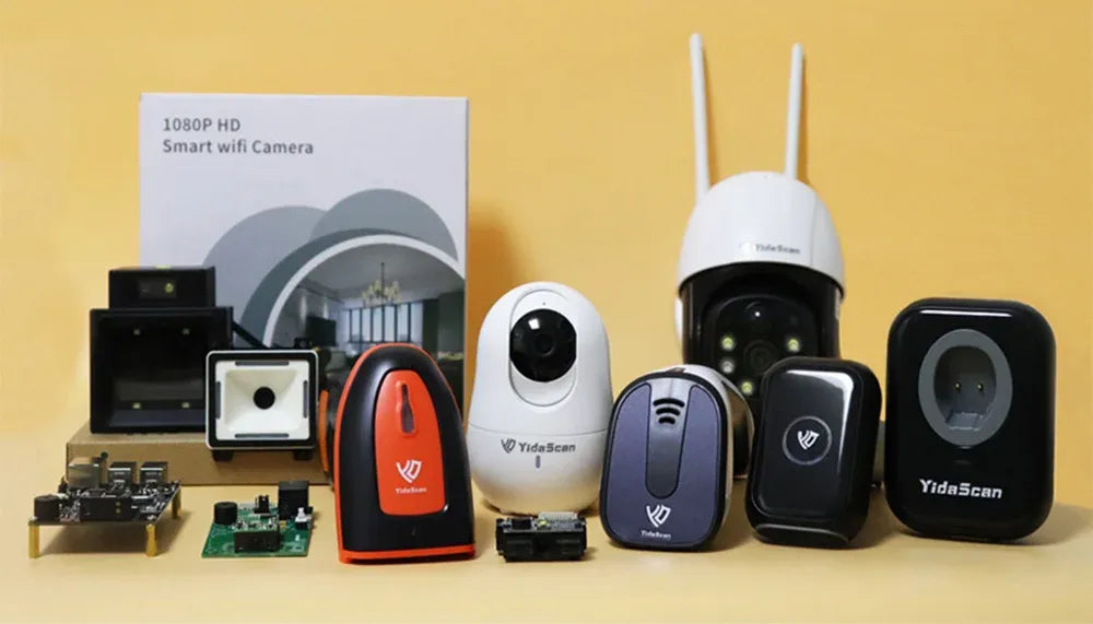 Assorted security cameras and smart devices arranged on a tabletop