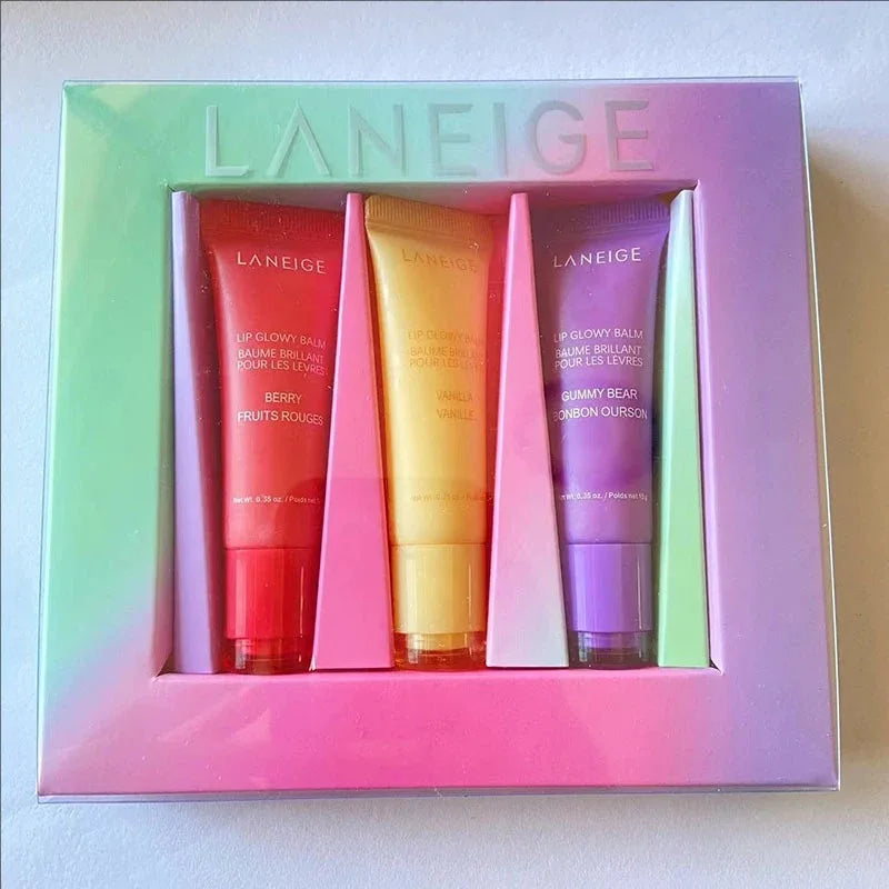Laneige Lip Glowy Balm set featuring Berry, Vanilla, and Gummy Bear moisturizing tinted lip glaze tubes in a gift box.