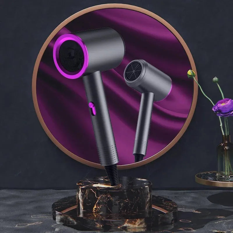 Professional high-speed hair dryer in matte grey with purple ring, sleek modern design for salons and home styling.