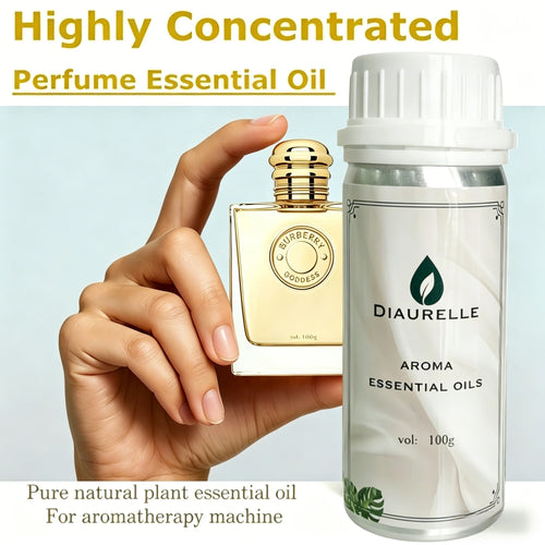 Diaurelle aromatherapy essential oil in white bottle with Burberry Goddess perfume for wellness and fragrance diffusers.
