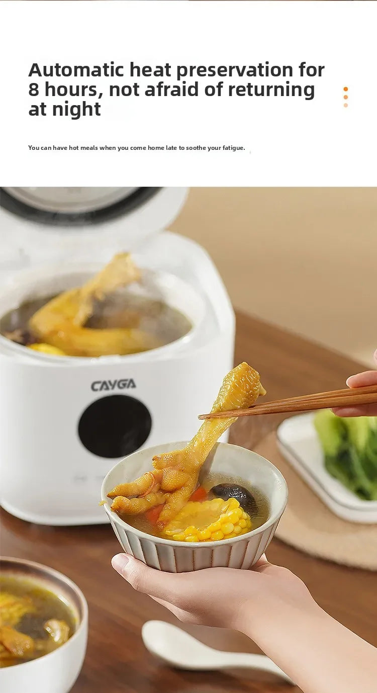 White digital mini rice cooker serving bowl of food with ceramic inner pot