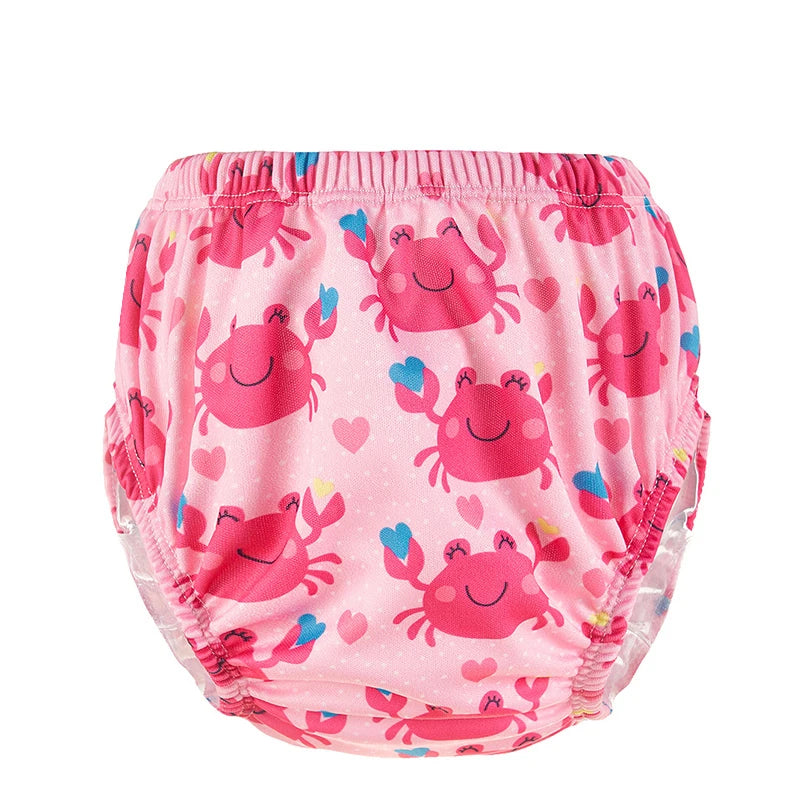 Pink baby swim diaper with cute crab and heart pattern for infant water play.