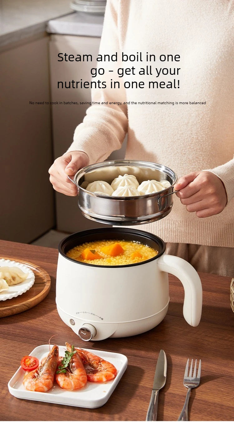 White electric multi cooker hot pot with glass lid, round inner pot filled with dumplings