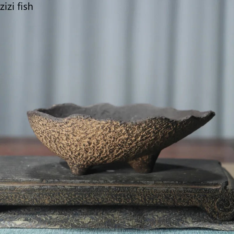 Textured ceramic flowerpot planter, bowl silhouette with dark interior and speckled exterior