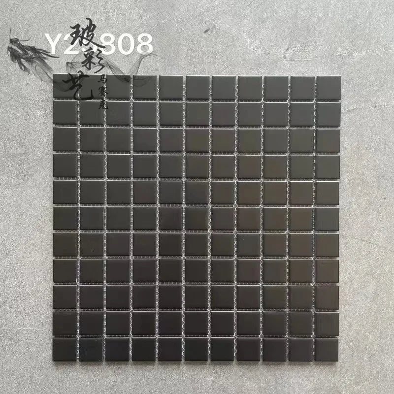 Dark gray ceramic mosaic tile sheet with glossy square grid and silver grout lines