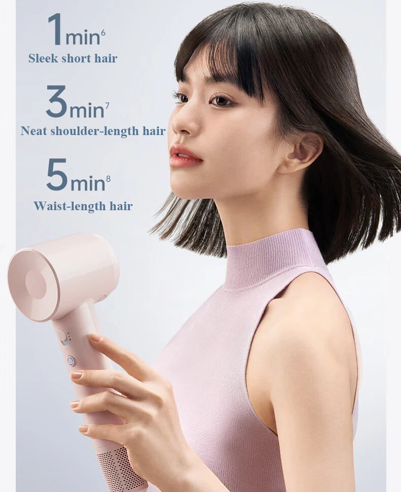 Lightweight 345g pink high-speed hair dryer with fast-drying, noise-reduction technology for all hair lengths.