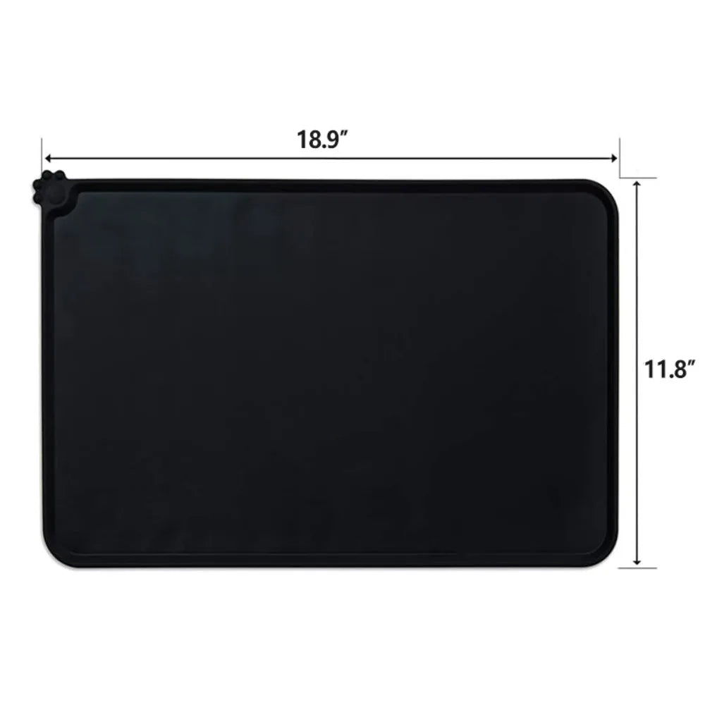 Black waterproof silicone pet feeding mat, 18.9x11.8", with raised edges to prevent spills for cats and dogs.