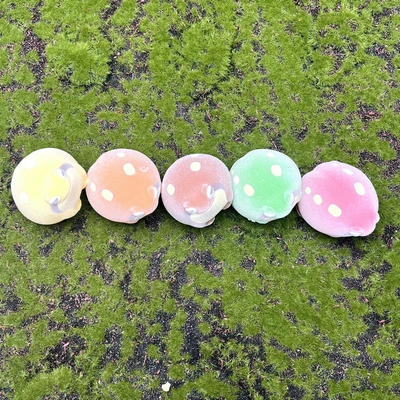 Set of 5 kawaii flocked rain frog squeeze figures in colorful soft textures for stress relief and fun pet-inspired decor.